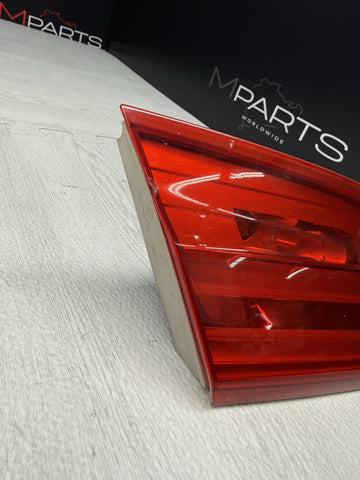 2011–2013 BMW 3 Series E92 Left Inner Trunk Lid Tail Light OEM 7252779 *Chip
