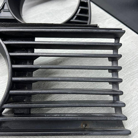 84-92 BMW 318i Left (1 945 885.0) & Right (1 876 094.0) Headlight Grille E30 OEM