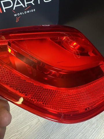 07-10 BMW E92 335 M3 COUPE LEFT OUTER LCI TAIL LIGHT OEM 7251959 *TINY CRACK*