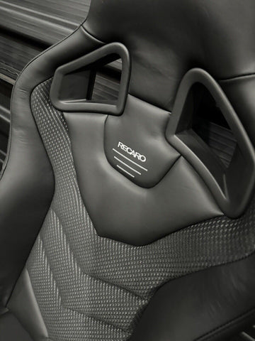 Recaro Black Leather with Carbon Weave Sub Belt Hole Sportster GT Seats