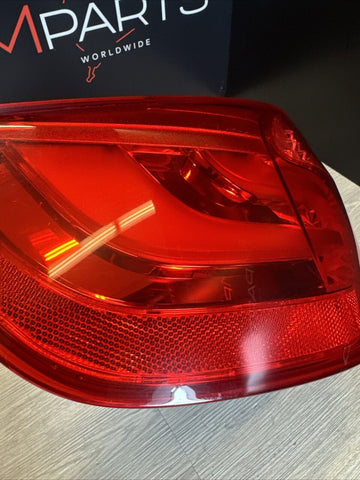 07-10 BMW E92 335 M3 COUPE LEFT OUTER LCI TAIL LIGHT OEM 7251959 *TINY CRACK*