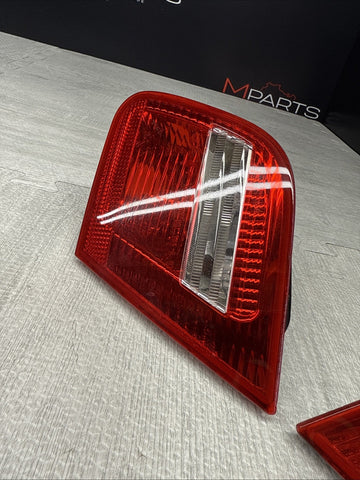 03-06 BMW E46 325 330 M3 Trunk Mounted Inner Tail lights Pair 6920705 6920706