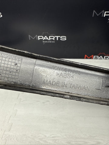 01–06 BMW E46 M3 Lower Headlight Trim Left Driver Black 8208679 Aftermarket