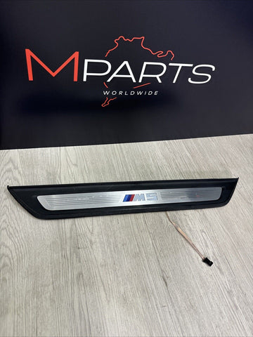 18-24 BMW F90 M5 Front Illuminated Door Sill Trim Panel 8061069 OEM