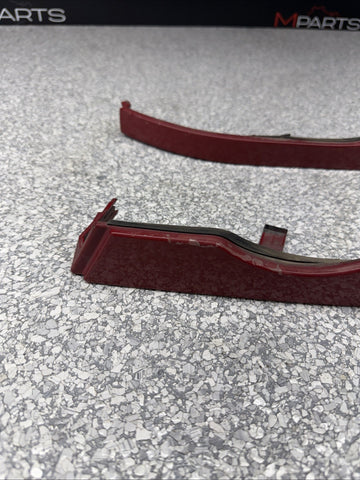 01-06 BMW E46 M3 FRONT LOWER HEADLIGHT TRIMS SET OEM IMOLA RED
