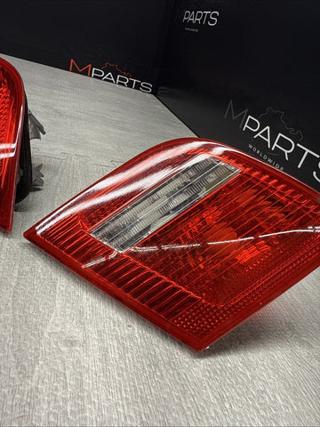 03-06 BMW E46 325 330 M3 Trunk Mounted Inner Tail lights Pair 6920705 6920706