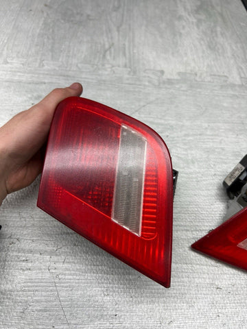 03-06 BMW E46 325 330 M3 Trunk Mounted Inner Tail lights Pair 6920705 6920706