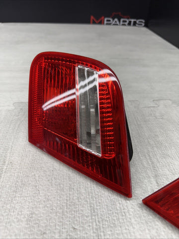 03-06 BMW E46 325 330 M3 Trunk Mounted Inner Tail lights Pair 6920705 6920706