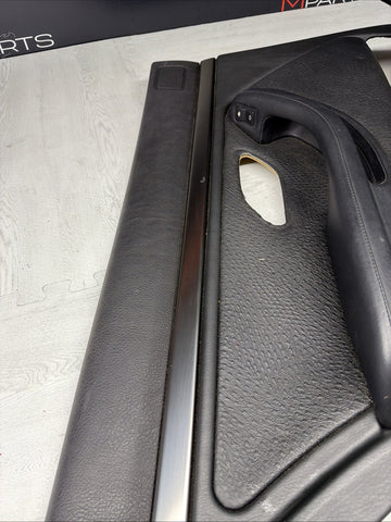 99-03 OEM BMW E39 M5 Rear Left Driver Door Panel  Leather Black *Notes*